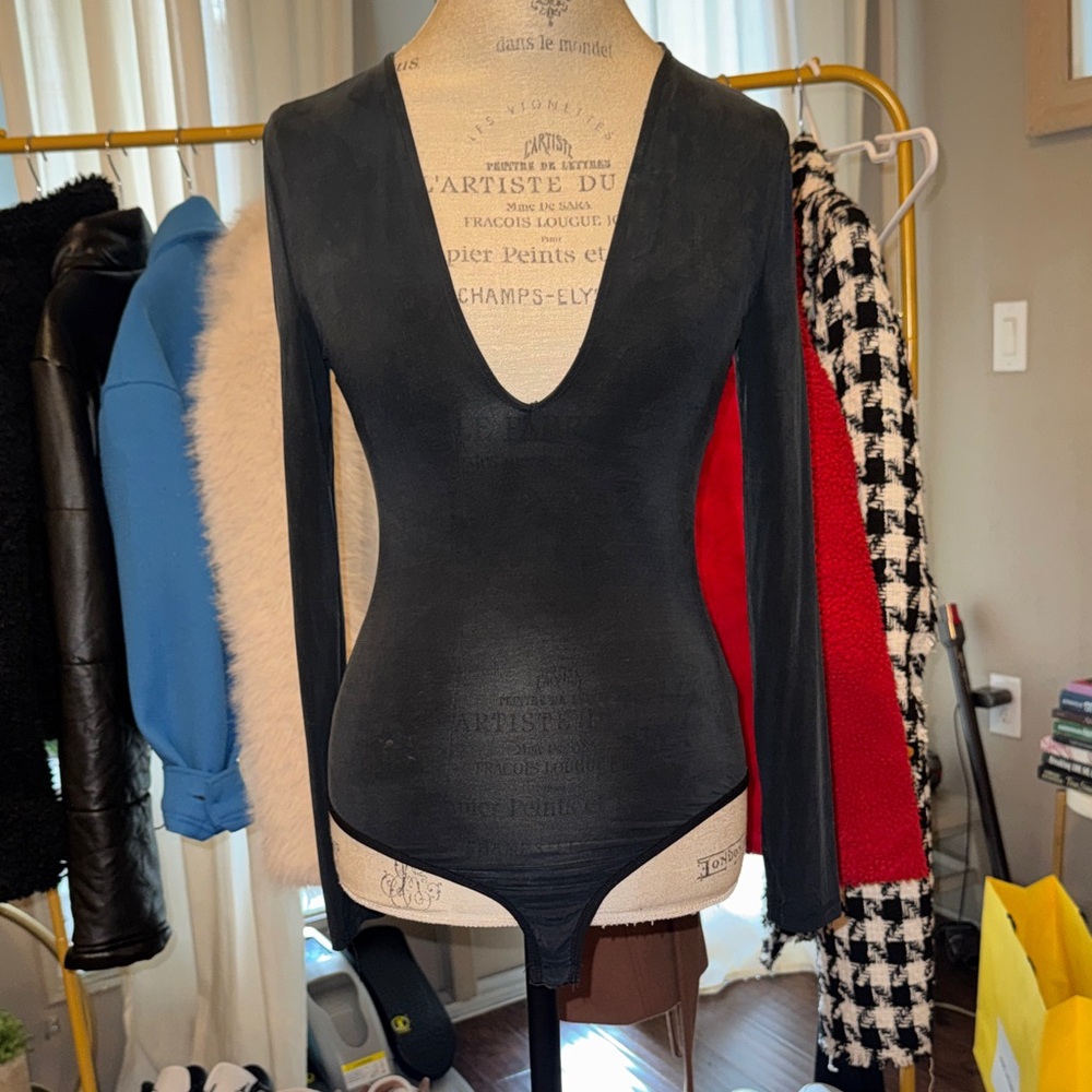 Bebe black low cut neckline longsleeve bodysuit dressy women’s top shirt Medium